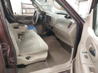 2001 Ford F-150 XLT with VIN 1FTRW08L51KE26356, listed as a IAAI auction lot 41011838 with Not provided miles and . Bid and sale history available at DreamBid. Image 5.