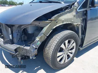 2014 Honda Odyssey EX-L z VIN 5FNRL5H69EB095297, wystawiony jako IAAI lot #42299438 z przebiegiem 126 841 mil mil oraz . Historia ofert i sprzedaży dostępna na DreamBid. Obrazek 6.