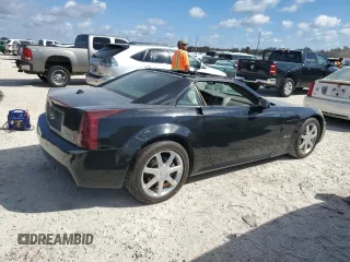 2005 Cadillac XLR z VIN 1G6YV34A955600330, wystawiony jako Copart lot #76173224 z przebiegiem Nie podano mil oraz Szkody całkowita. Historia ofert i sprzedaży dostępna na DreamBid. Obrazek 3.