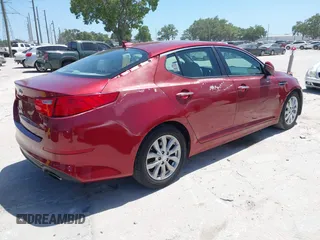 2014 Kia Optima LX with VIN 5XXGM4A75EG329546, listed as a IAAI auction lot 42159226 with 200,963 mi miles. Bid and sale history available at carsss.com. Image 4.