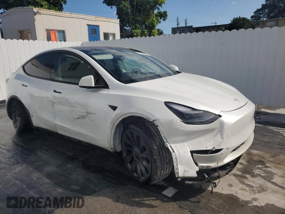 2023 Tesla Model Y Performance with VIN 7SAYGDEF8PF595178, listed as a Copart auction lot 46496995 with 39,057 mi miles and Non Repairable. Bid and sale history available at DreamBid. Image 4.