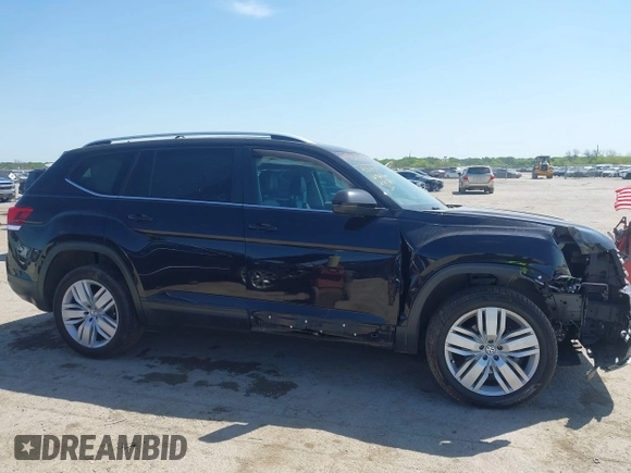 2019 Volkswagen Atlas SE with VIN 1V2WR2CA4KC595211, listed as a IAAI auction lot 41986643 with 96,299 mi miles and . Bid and sale history available at DreamBid. Image 13.