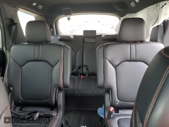2024 Honda Pilot TrailSport z VIN 5FNYG1H60RB045659, wystawiony jako Copart lot #58575955 z przebiegiem 16 681 mil mil oraz Szkoda całkowita • Salvage title. Historia ofert i sprzedaży dostępna na DreamBid. Obrazek 10.