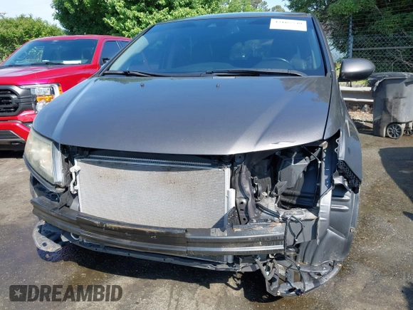 2015 Honda Odyssey EX-L z VIN 5FNRL5H61FB126947, wystawiony jako IAAI lot #42165599 z przebiegiem 213 058 mil mil oraz . Historia ofert i sprzedaży dostępna na DreamBid. Obrazek 6.