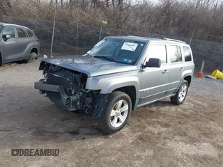 2012 Jeep Patriot Latitude with VIN 1C4NJRFB3CD599831, listed as a IAAI auction lot 41627914 with 135,534 mi miles and . Bid and sale history available at carsss.com. Image 2.