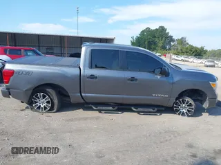2023 Nissan Titan SV with VIN 1N6AA1EC6PN101712, listed as a IAAI auction lot 40206621 with 50,210 mi miles and . Bid and sale history available at DreamBid. Image 6.