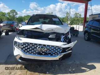2023 Hyundai Santa Fe Limited z VIN 5NMS4DAL8PH655580, wystawiony jako IAAI lot #42267740 z przebiegiem 10 170 mil mil oraz . Historia ofert i sprzedaży dostępna na DreamBid. Obrazek 12.