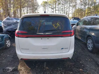 2023 Chrysler Pacifica Hybrid Limited with VIN 2C4RC1S73PR626236, listed as a IAAI auction lot 41696687 with 42,590 mi miles. Bid and sale history available at carsss.com. Image 16.