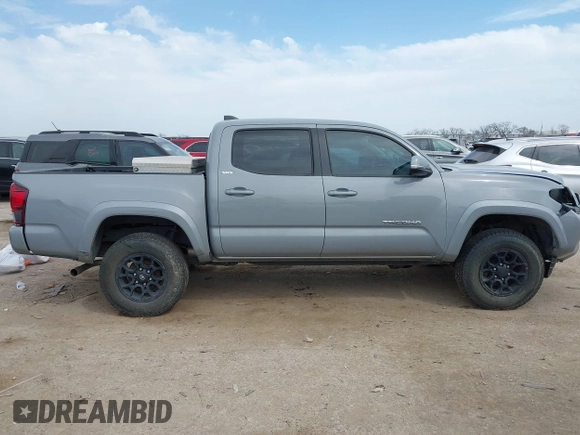 2021 Toyota Tacoma 4WD SR with VIN 5TFCZ5AN3MX260853, listed as a IAAI auction lot 41784451 with 122,244 mi miles. Bid and sale history available at carsss.com. Image 13.
