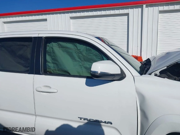 2019 Toyota Tacoma 4WD SR with VIN 3TMCZ5ANXKM195356, listed as a IAAI auction lot 41374965 with 177,927 mi miles. Bid and sale history available at carsss.com. Image 14.