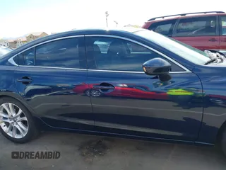 2015 Mazda 6 i Touring with VIN JM1GJ1V61F1170532, listed as a IAAI auction lot 42078436 with 154,630 mi miles and . Bid and sale history available at DreamBid. Image 13.
