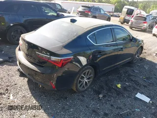 2019 Acura ILX Premium with VIN 19UDE2F74KA015263, listed as a IAAI auction lot 41997753 with 57,673 mi miles and . Bid and sale history available at DreamBid. Image 4.