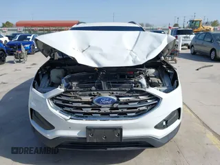 2020 Ford Edge SE z VIN 2FMPK3G92LBA35135, wystawiony jako IAAI lot #41851720 z przebiegiem 49 534 mil mil oraz . Historia ofert i sprzedaży dostępna na DreamBid. Obrazek 13.