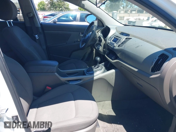 2012 Kia Sportage LX z VIN KNDPBCA21C7297706, wystawiony jako IAAI lot #42804922 z przebiegiem 187 840 mil mil oraz . Historia ofert i sprzedaży dostępna na DreamBid. Obrazek 5.
