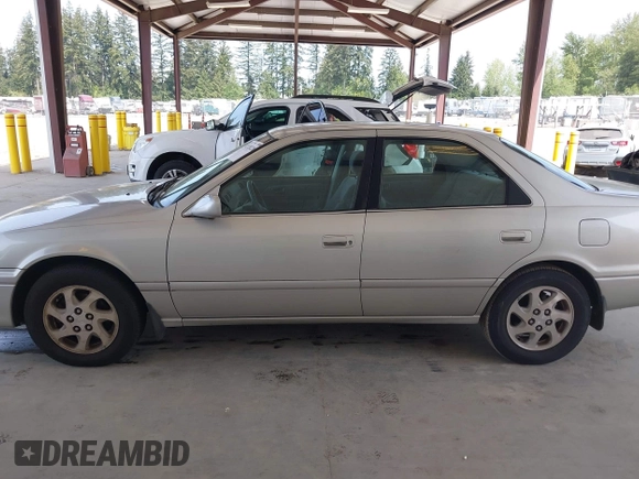 2000 Toyota Camry LE z VIN JT2BF22K2Y0239961, wystawiony jako IAAI lot #42128226 z przebiegiem 154 691 mil mil oraz . Historia ofert i sprzedaży dostępna na DreamBid. Obrazek 14.