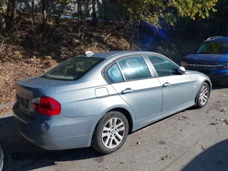 2006 BMW 3 Series 325xi with VIN WBAVD13576KV09164, listed as a IAAI auction lot 40558363 with 148,819 mi miles. Bid and sale history available at carsss.com. Image 4.