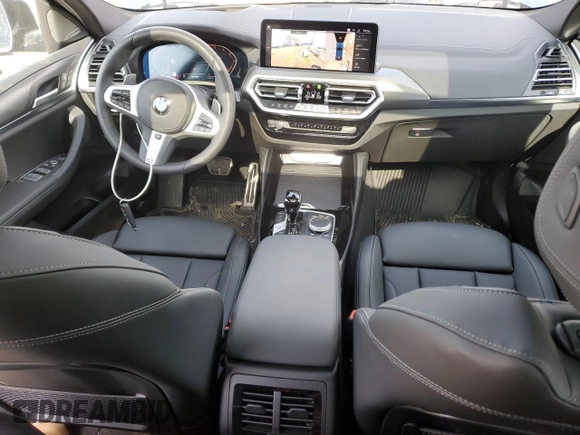 2025 BMW X4 xDrive30i with VIN 5UX33DT05S9Y19798, listed as a Copart auction lot 51861845 with 718 mi miles and Salvage Title. Bid and sale history available at carsss.com. Image 8.