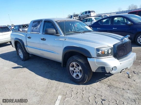 2006 Dodge Dakota SLT with VIN 1D7HE48N76S640351, listed as a IAAI auction lot 41121248 with 155,463 mi miles. Bid and sale history available at carsss.com. Image 1.