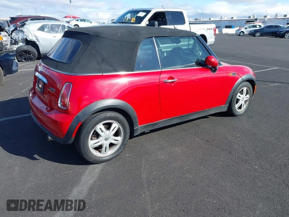 2007 MINI Convertible with VIN WMWRF33527TG17570, listed as a IAAI auction lot 41818884 with 103,447 mi miles and . Bid and sale history available at DreamBid. Image 4.