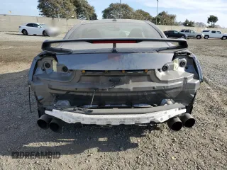 2017 Nissan GT-R Premium z VIN JN1AR5EF0HM820283, wystawiony jako Copart lot #80291674 z przebiegiem 98 489 mil mil oraz Szkoda całkowita • Salvage title. Historia ofert i sprzedaży dostępna na DreamBid. Obrazek 6.