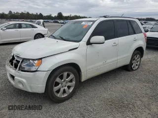 2011 Suzuki Grand Vitara Limited z VIN JS3TE0D73B4100502, wystawiony jako Copart lot #77589524 z przebiegiem 195 572 mil mil oraz Szkoda całkowita • Salvage title. Historia ofert i sprzedaży dostępna na DreamBid. Obrazek 1.