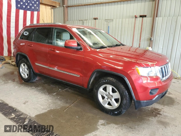 2011 Jeep Grand Cherokee Laredo with VIN 1J4RR4GG3BC669561, listed as a Copart auction lot 63627395 with 99,211 mi miles and Salvage title. Bid and sale history available at DreamBid. Image 4.