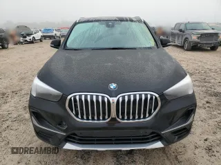 2021 BMW X1 xDrive28i with VIN WBXJG9C07M5T06155, listed as a Copart auction lot 84222754 with 18,466 mi miles and Salvage Title. Bid and sale history available at carsss.com. Image 5.