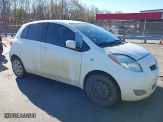 2010 Toyota Yaris with VIN JTDKT4K39A5289561, listed as a IAAI auction lot 41860064 with 176,642 mi miles. Bid and sale history available at carsss.com. Image 6.