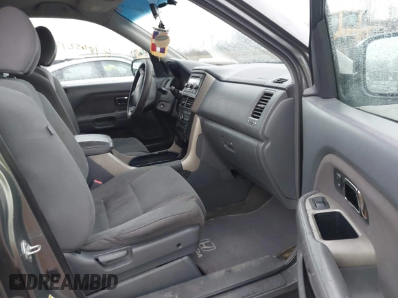 2008 Honda Pilot SE with VIN 5FNYF18398B001764, listed as a IAAI auction lot 41865212 with 355,052 mi miles and . Bid and sale history available at DreamBid. Image 5.