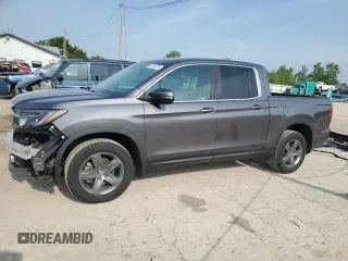 2021 Honda Ridgeline RTL z VIN 5FPYK3F58MB017077, wystawiony jako Copart lot #60499275 z przebiegiem 72 274 mil mil oraz Szkoda całkowita • Salvage title. Historia ofert i sprzedaży dostępna na DreamBid. Obrazek 1.