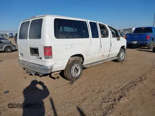 2014 Ford Econoline Passenger XL with VIN 1FBNE3BL1EDA97830, listed as a IAAI auction lot 41633760 with 100,953 mi miles. Bid and sale history available at carsss.com. Image 4.