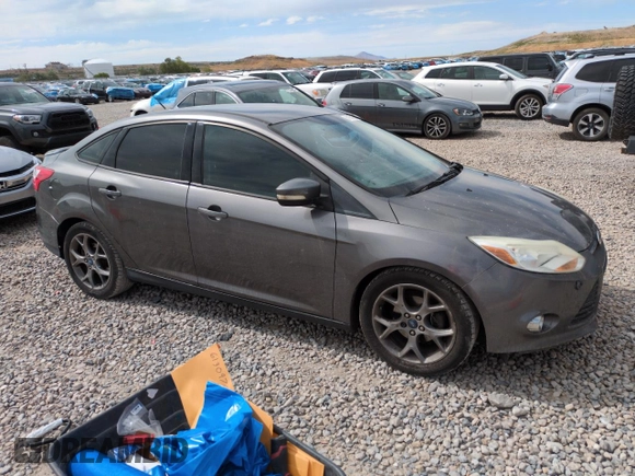 2013 Ford Focus SE with VIN 1FADP3F24DL189897, listed as a Copart auction lot 61970155 with 212,218 mi miles and Salvage title. Bid and sale history available at DreamBid. Image 4.