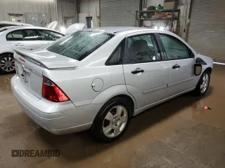 2007 Ford Focus S z VIN 1FAHP34N37W262789, wystawiony jako Copart lot #50814405 z przebiegiem 56 604 mil mil oraz Szkoda całkowita • Salvage title. Historia ofert i sprzedaży dostępna na DreamBid. Obrazek 3.