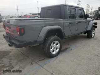 2021 Jeep Gladiator Texas Trail with VIN 1C6JJTAM7ML558492, listed as a Copart auction lot 86909804 with 38,171 mi miles and Salvage Title. Bid and sale history available at carsss.com. Image 3.