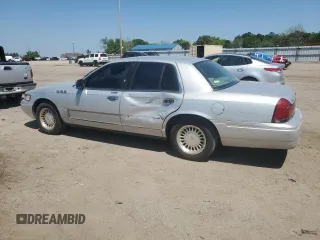 1999 Mercury Grand Marquis LS z VIN 2MEFM75W5XX673218, wystawiony jako Copart lot #52621285 z przebiegiem 163 642 mil mil oraz Szkoda całkowita • Salvage title. Historia ofert i sprzedaży dostępna na DreamBid. Obrazek 2.