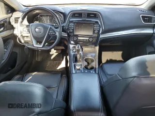 2020 Nissan Maxima SL с VIN 1N4AA6DV3LC361192, выставлен на аукционе Copart как лот 49421965 с пробегом 94 434 миль миль и Списание • Salvage title. История ставок и продаж доступна на DreamBid. Изображение 8.