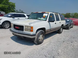 1996 GMC Suburban with VIN 1GKFK16R3TJ726521, listed as a IAAI auction lot 42055945 with 170,893 mi miles. Bid and sale history available at carsss.com. Image 2.