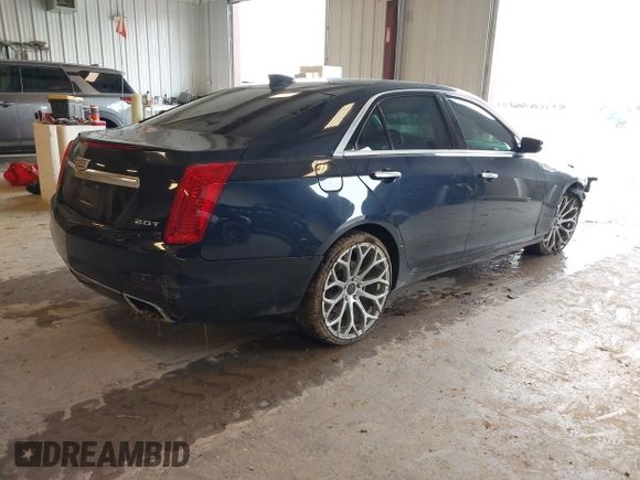 2015 Cadillac CTS AWD z VIN 1G6AW5SXXF0136481, wystawiony jako IAAI lot #42173024 z przebiegiem 128 984 mil mil oraz . Historia ofert i sprzedaży dostępna na DreamBid. Obrazek 4.