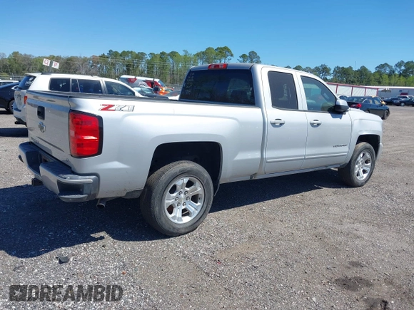 2018 Chevrolet Silverado 1500 LT with VIN 1GCVKREC9JZ335603, listed as a IAAI auction lot 41853399 with 152,460 mi miles and . Bid and sale history available at DreamBid. Image 4.