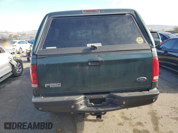2001 Ford Super Duty F-250 XL with VIN 1FTNW21S21EB56495, listed as a Copart auction lot 85972944 with 142,122 mi miles and Salvage Title. Bid and sale history available at carsss.com. Image 6.