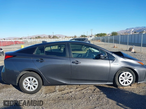 2020 Toyota Prius L Eco z VIN JTDKARFU2L3120891, wystawiony jako IAAI lot #41318597 z przebiegiem 79 848 mil mil oraz . Historia ofert i sprzedaży dostępna na DreamBid. Obrazek 13.