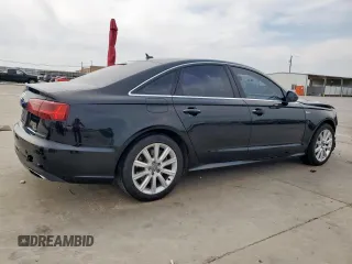 2016 Audi A6 Premium Plus with VIN WAUFGAFC0GN002774, listed as a Copart auction lot 52775355 with 140,188 mi miles and Salvage Title. Bid and sale history available at DreamBid. Image 3.
