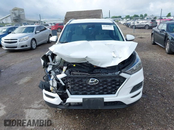 2019 Hyundai Tucson Value z VIN KM8J33A41KU013023, wystawiony jako IAAI lot #42302643 z przebiegiem 41 231 mil mil oraz . Historia ofert i sprzedaży dostępna na DreamBid. Obrazek 12.