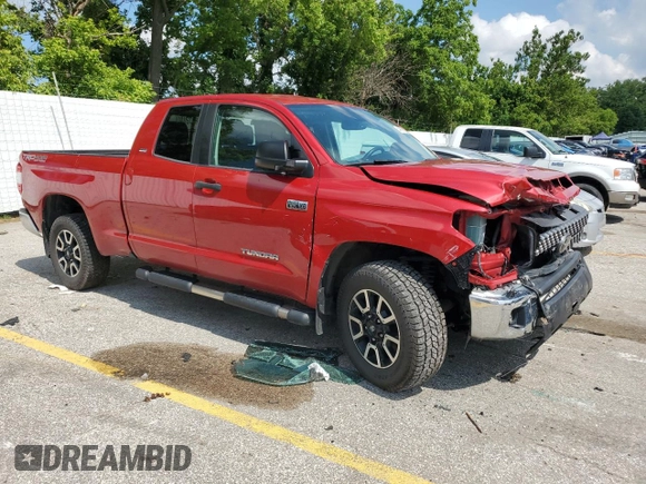 2021 Toyota Tundra SR with VIN 5TFUY5F11MX971951, listed as a Copart auction lot 64889875 with 69,297 mi miles and Salvage title. Bid and sale history available at DreamBid. Image 4.