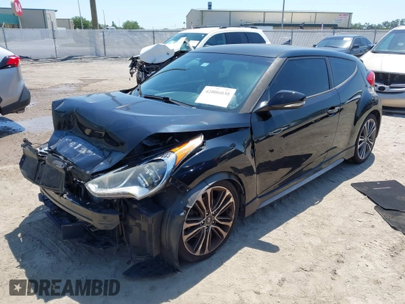 2016 Hyundai Veloster Turbo with VIN KMHTC6AE5GU281597, listed as a IAAI auction lot 42006038 with 77,642 mi miles. Bid and sale history available at carsss.com. Image 18.
