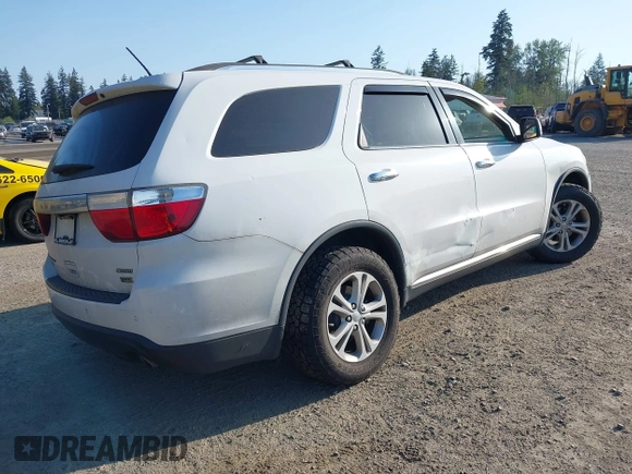2013 Dodge Durango Crew with VIN 1C4RDJDG3DC664855, listed as a IAAI auction lot 42109159 with 148,440 mi miles and . Bid and sale history available at DreamBid. Image 4.