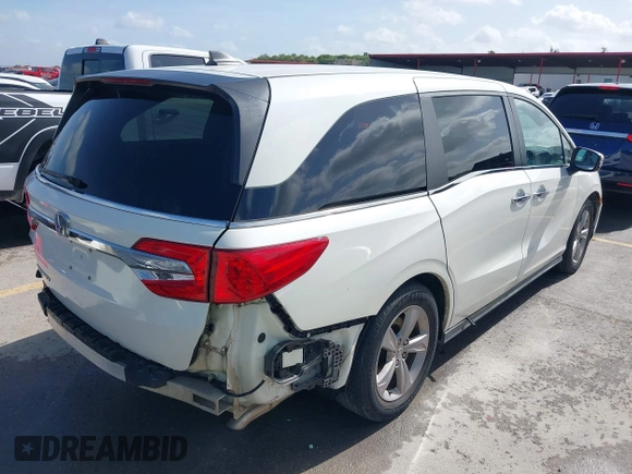 2018 Honda Odyssey EX with VIN 5FNRL6H57JB100035, listed as a IAAI auction lot 42582758 with 88,585 mi miles and . Bid and sale history available at DreamBid. Image 20.