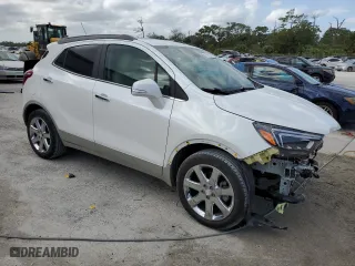 2017 Buick Encore Premium with VIN KL4CJDSB1HB022857, listed as a Copart auction lot 76746504 with 34,180 mi miles and Salvage Title. Bid and sale history available at carsss.com. Image 4.