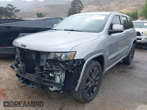 2017 Jeep Grand Cherokee Laredo with VIN 1C4RJEAG0HC702195, listed as a IAAI auction lot 42427597 with 104,403 mi miles and . Bid and sale history available at DreamBid. Image 20.
