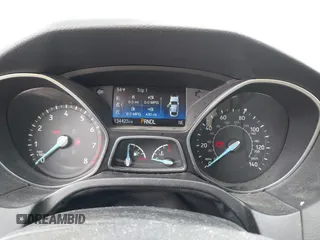 2016 Ford Focus SE z VIN 1FADP3F26GL332224, wystawiony jako IAAI lot #42167222 z przebiegiem 134 423 mil mil oraz . Historia ofert i sprzedaży dostępna na DreamBid. Obrazek 7.